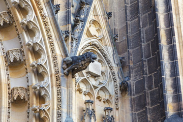 The gothic architecture detail - gargoyle on St. Vitus cathedral in Prague Castle in Prague