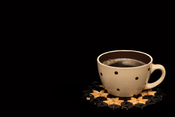 Isolated set of colourful coffee mugs on a black background