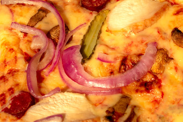 Delicious onion and meat pizza texture, closeup