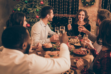 Nice attractive lovely shine glamorous smart stylish cheerful cheery positive glad guys spending leisure weekend saying toast greetings congrats congratulating served desk in decorated house © deagreez