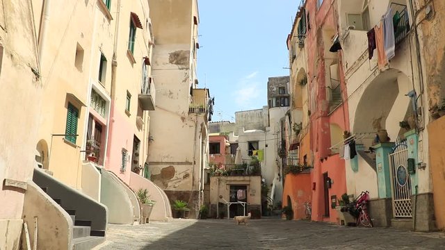 Village of Procida, Mediterranean Sea, near Naples. Characteristic Mediterranean-style courtyard with colorful houses. 