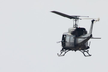 machine gun aiming from a helicopter. White background