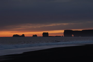 beautiful autum sunset at the beach of Vik in Iceland.