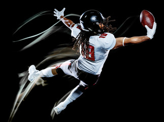 Naklejka na ściany i meble one african american football player man studio shot isolated on black background with light painting with blurred motion speed effect