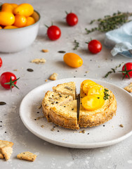Savoury cheesecake with tomatoes and thyme.