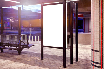 Mockup of a blank empty white advertising urban billboard indoor at the train station, space for design layout.