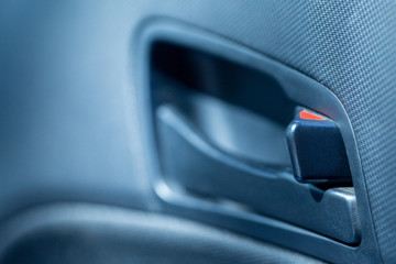 Car door plastic handle locked. Close-up view