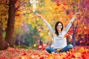 Happy Woman Enjoying Life in the Autumn