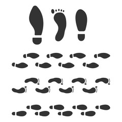 Human footprint and tracks vector black silhouette set isolated on a white background.