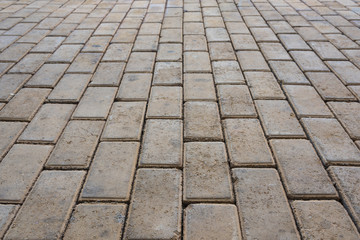 Old yellow brick low angle pavement vintage background view