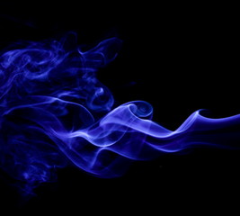Blue smoke on black background