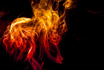 Colored smoke on black background