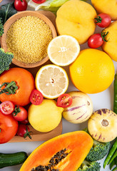 Full screen of fresh seasonal fruits and vegetables and grains of legumes