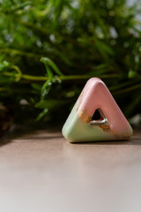 modern candies on green backdrop, sweet food