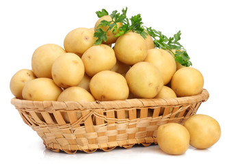 Potatoes in basket on white background