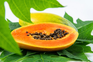 Cut golden yellow papaya pulp closeup