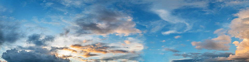Obraz premium Dramatic vibrant color with beautiful cloud of sunrise and sunset on a cloudy day. Panoramic image.