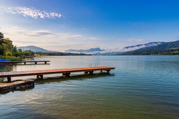 Obraz premium Panorama of a lake with a jetty, Irrsee, Austria