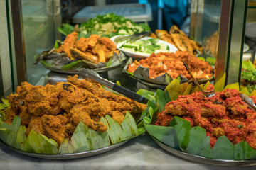 Various types of dishes selling at the food court