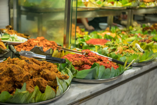 Various Types Of Dishes Selling At The Food Court