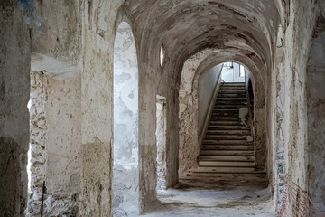 Fototapeta premium Corridor in an abandoned monastery