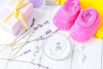 baby organic cream with lavender on shelf in bathroom