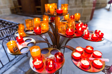 Red, White and Orange Prayers Candles Lit Up in Nantes Cathedral Saint-Pierre and Saint-Paul