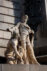 Obraz premium artistic monument in stone and bronze representing a statue