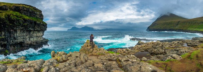 Spectacular panorama with unidentified photographer in the coastline