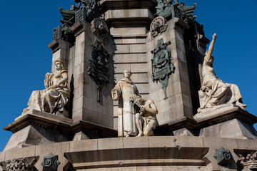 artistic monument in stone and bronze representing a statue