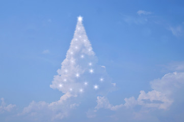 Magic Christmas Cloud with bright stars. dream Christmas tree as a cloud. The cloud is create a Christmas tree for Xmas day. Christmas backgrounds