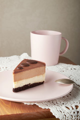chocolate cake white and dark chocolate on a pink plate