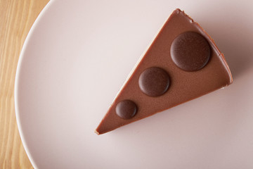 chocolate cake white and dark chocolate on a pink plate