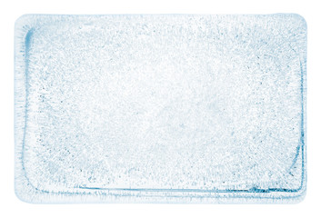 Large rectangle block of clear ice with frozen air bubbles, on white background, with clipping path.