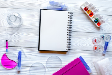 medical student working place at wooden table top view