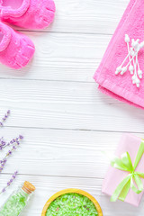 Natural organic cosmetics for baby with lavender on wooden background