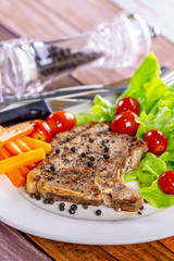 Pork steak white plate