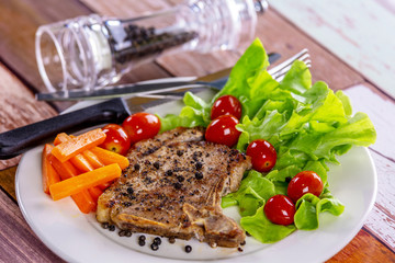 Pork steak white plate