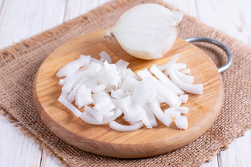 Fototapeta na wymiar Sliced onion on a chopping board