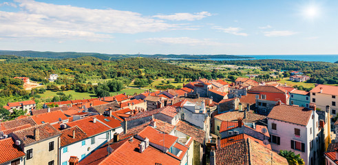 Fototapeta na wymiar Aerial view of Vrsar (Orsera) town. Colorful spring cityscape of Croatia, Europe. Traveling concept background. Beautiful Mediterranean seascape.