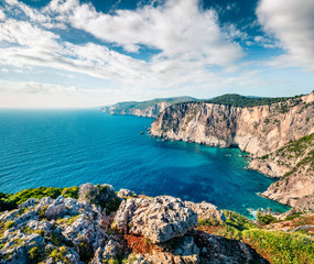 Gorgeous spring view of high cliffs on the Ionian Sea. Colorful morning seascape of Zakynthos (Zante) island, Greece, Europe. Beauty of nature concept background.