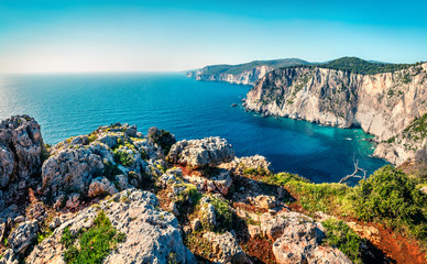 Aerial spring view of high cliffs on the Ionian Sea. Bright morning seascape of Zakynthos (Zante) island, Greece, Europe. Beauty of nature concept background.
