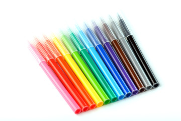 Fototapeta premium Multi-colored felt-tip pens, markers on a white isolated background