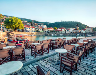 Fototapeta na wymiar Colorful morning view of the Nafpaktos port. Sunny spring scene of the Gulf of Corinth, Greece, Europe. Beauty of countryside concept background. Traveling concept background.