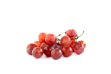 Closeup of red grapes with spray isolated on white background