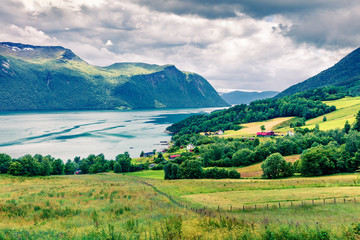 Typical countryside Norwegian landscape. Beautiful summer morning in Norway, Europe. Beauty of...