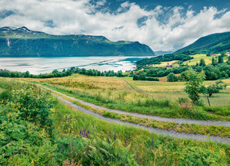 Typical countryside Norwegian landscape. Summy summer morning in Norway, Europe. Beauty of nature...