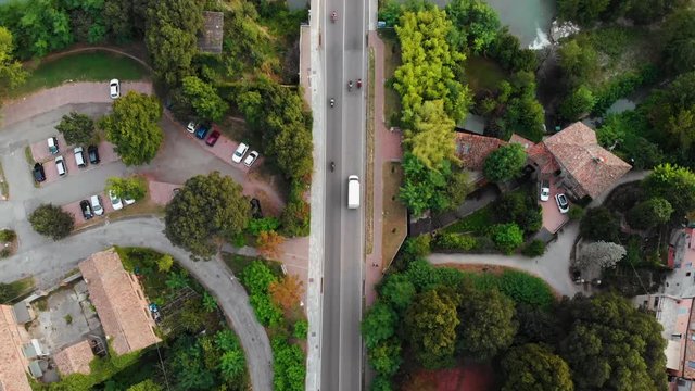 Aerial the road from vignola to savignano with cars and Panaro river Vignola September 2019 Modena Emilia Romagna Italy 4K