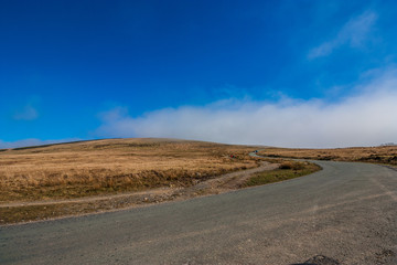 Fototapeta na wymiar Fog is Coming on the Road, Lake District, UK, 2015