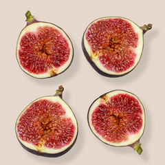 Fresh figs isolated on light pink background, styled photo